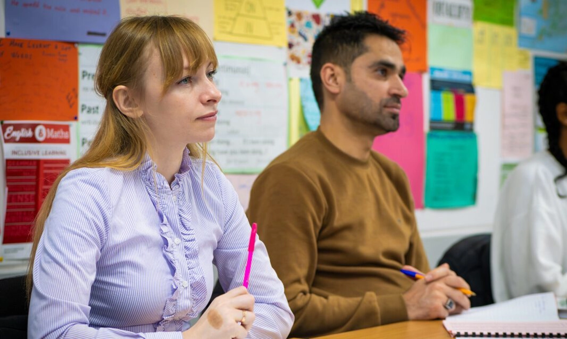 2 Adult ESOL students in a classroom