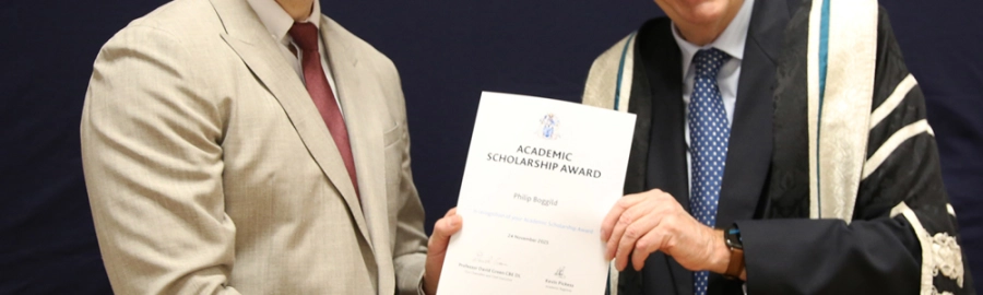 Cropped picture of someone receiving an award