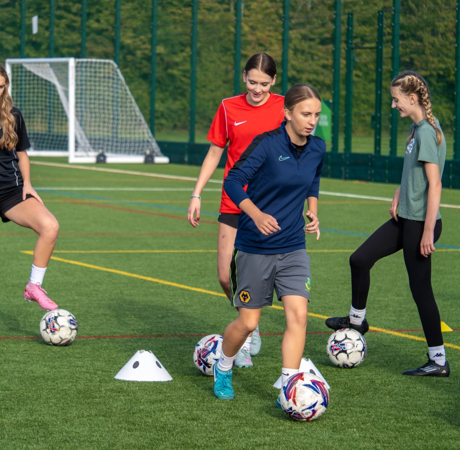 girls playing football