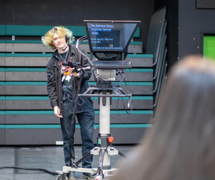 Student using media production equipment as part of their studies