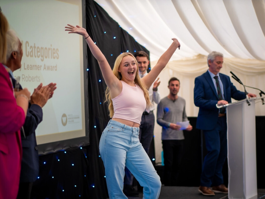 Student celebrating at award ceremony