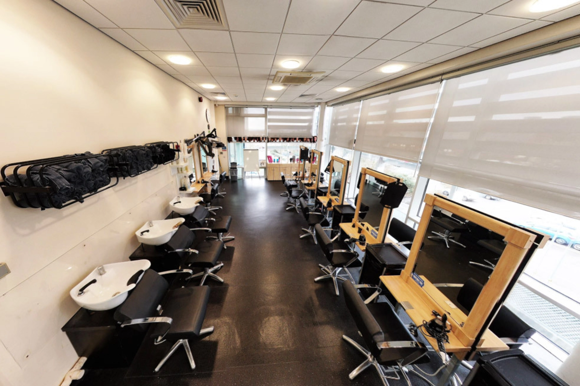 Hairdressing salon with sinks, chairs and stations