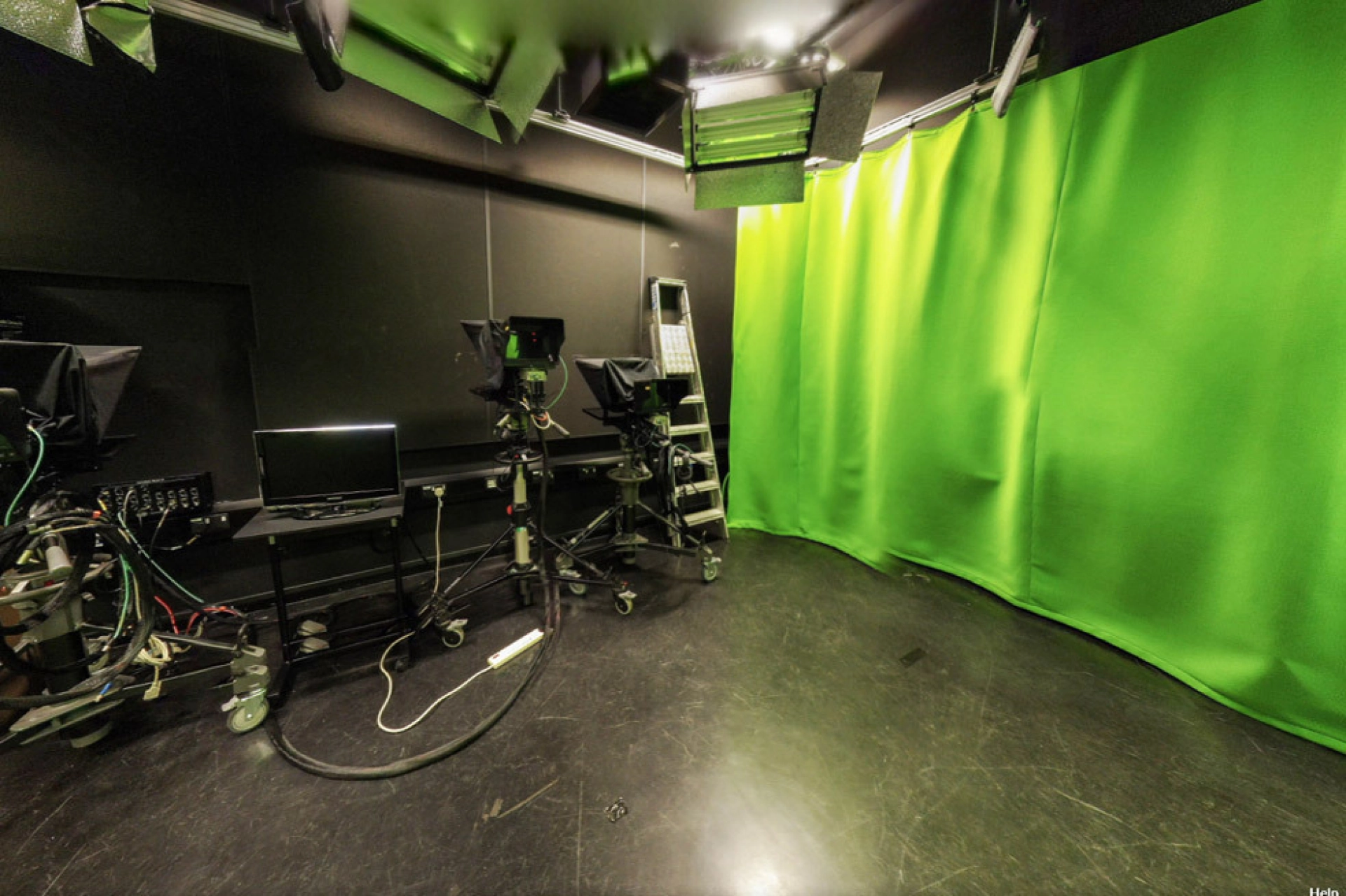 In college green screen studio with TV and Film equipment
