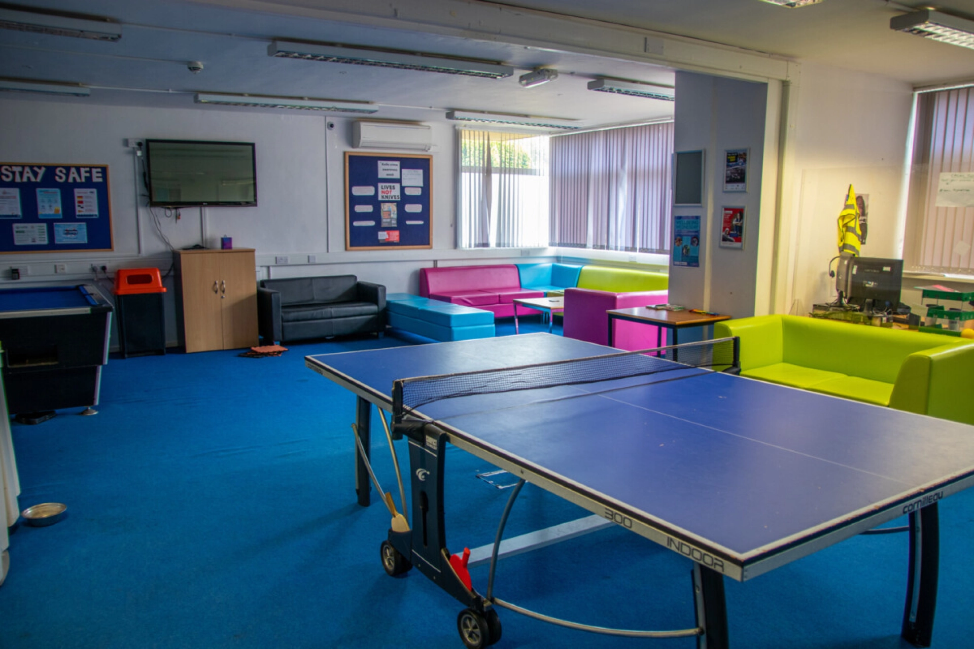 HoW R U Hub with sofas, and a table tennis table